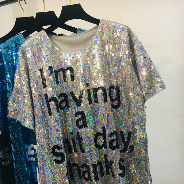 ÚJ Aktuális női flitteres blúz hosszú modell rövid ujjal