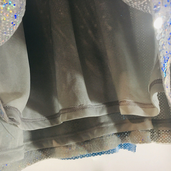 ÚJ Aktuális női flitteres blúz hosszú modell rövid ujjal