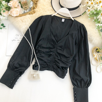 Női ing spitz nyakkivágással, ujjain gombokkal, többféle színben