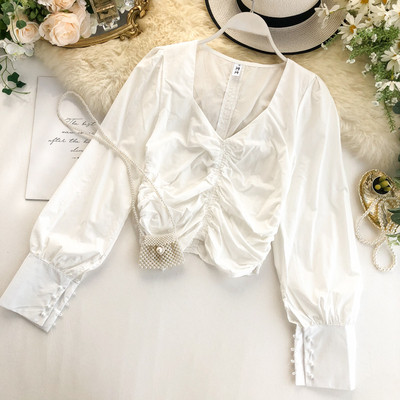 Női ing spitz nyakkivágással, ujjain gombokkal, többféle színben