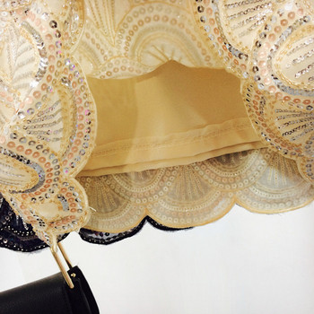 Κομψή κοντή γυναικεία φούστα με ψηλή μέση και πούλιες