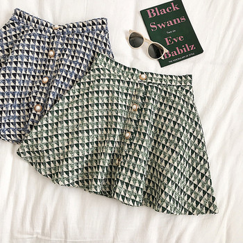 Aktuális női szoknya két színben, gombos kivágású modell