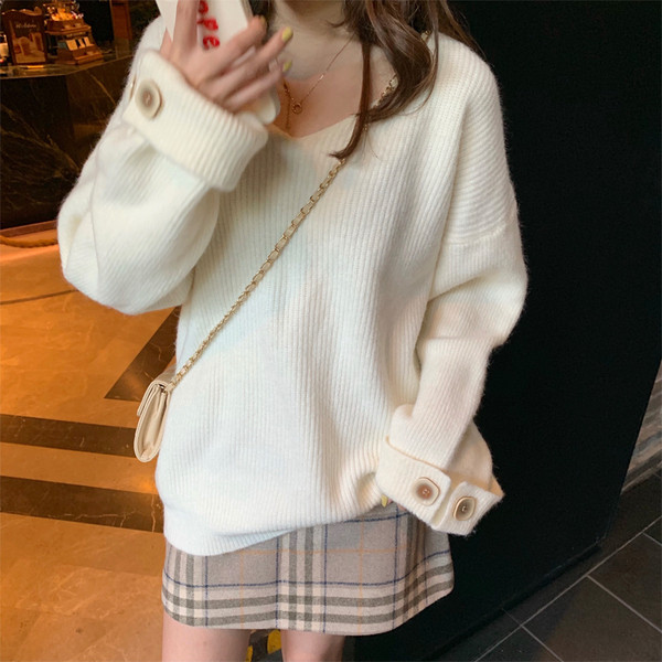 Női modern kötött blúz három színben, ovális nyakkivágással