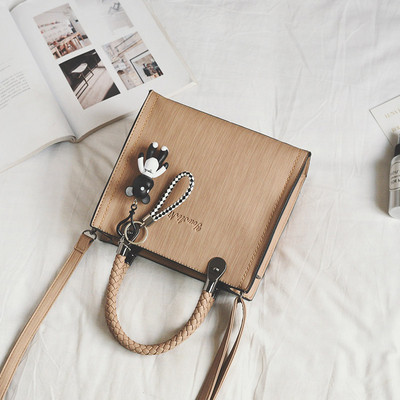 Stílusos női táska rövid és hosszú füllel, öt színben