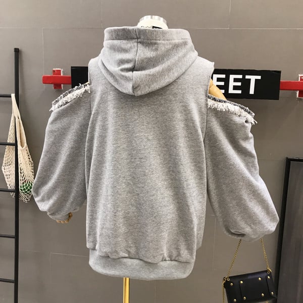 Női sportpulóver kapucnival és csupasz vállú szürke színben