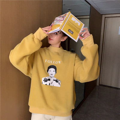 Női alkalmi blúz ovális nyakkivágással, rátéttel