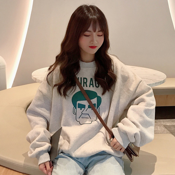 Bluză casual de damă cu aplicație model larg cu decolteu oval