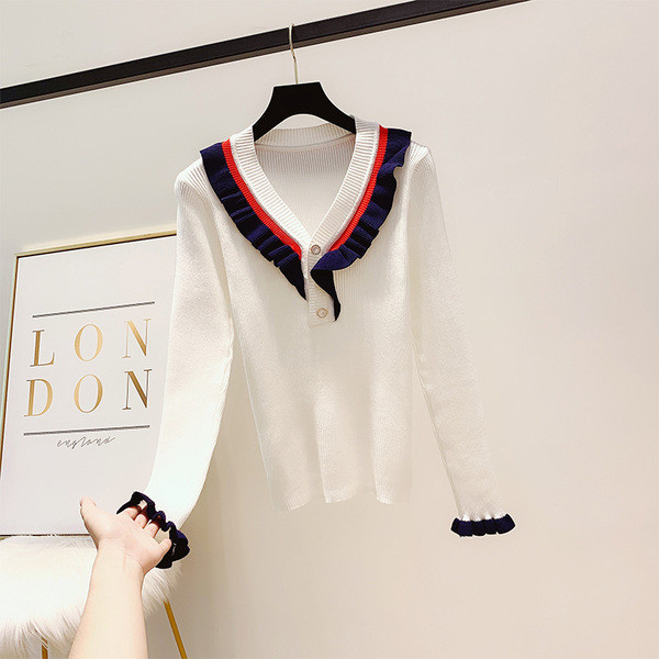 Modern női blúz spitz nyakkivágással és gombokkal több színben