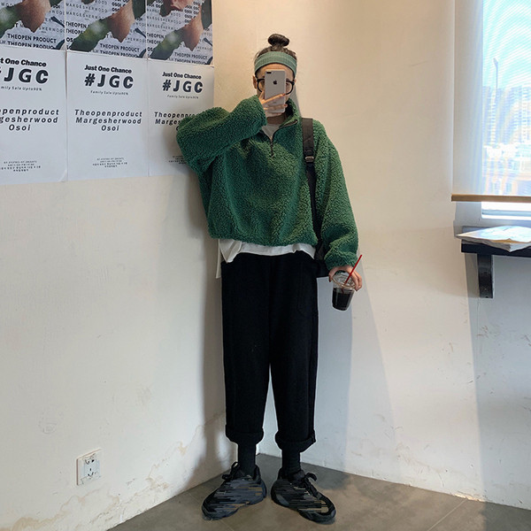 Modern női blúz két színben, magas gallérral és cipzárral