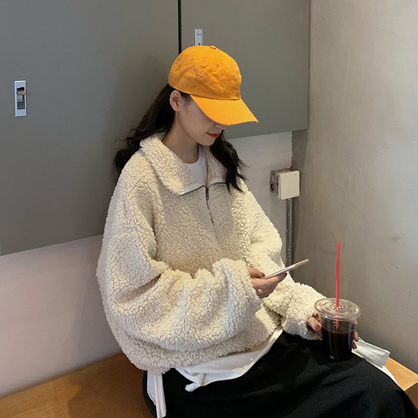 Modern női blúz két színben, magas gallérral és cipzárral