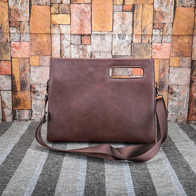 Мъжка кожена чанта с дълга дръжка в черен и кафяв цвят 