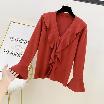 Női pulóver spitz nyakkivágással és gombokkal több színben