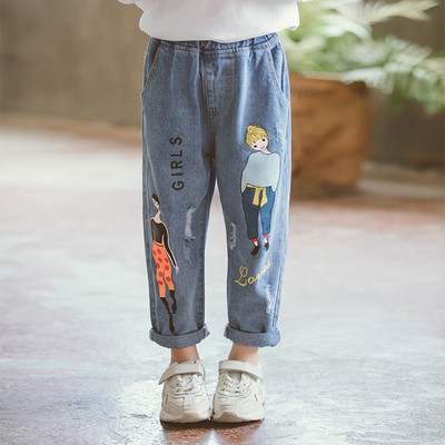 Blugi moderni pentru copii cu motive rupte si aplicatii in albastru si negru pentru fete