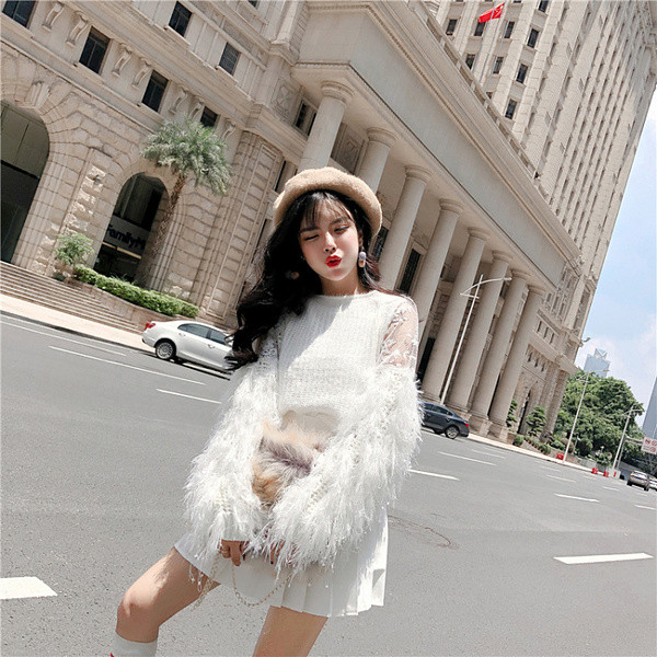 Női téli pulóver széles modell fehér és rózsaszín színben