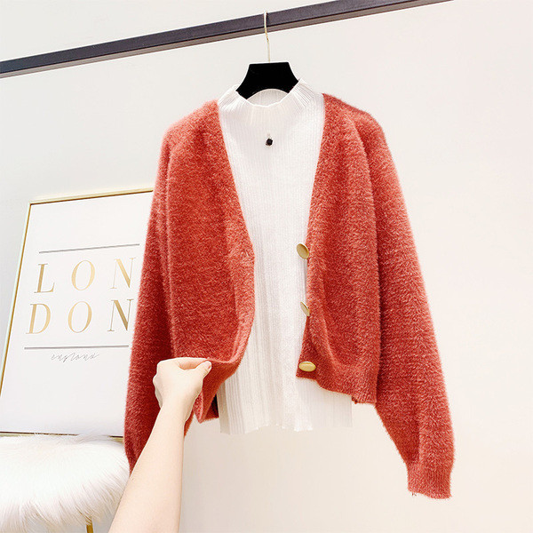 Női pehelymellény gombokkal, többféle színben