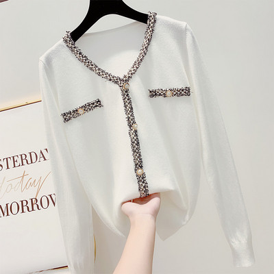 Pulover de damă modern cu decolteu spitz în alb-negru