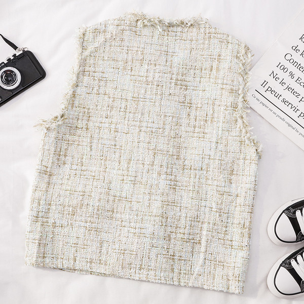 Нов модел дамски елек в светъл и тъмен цвят