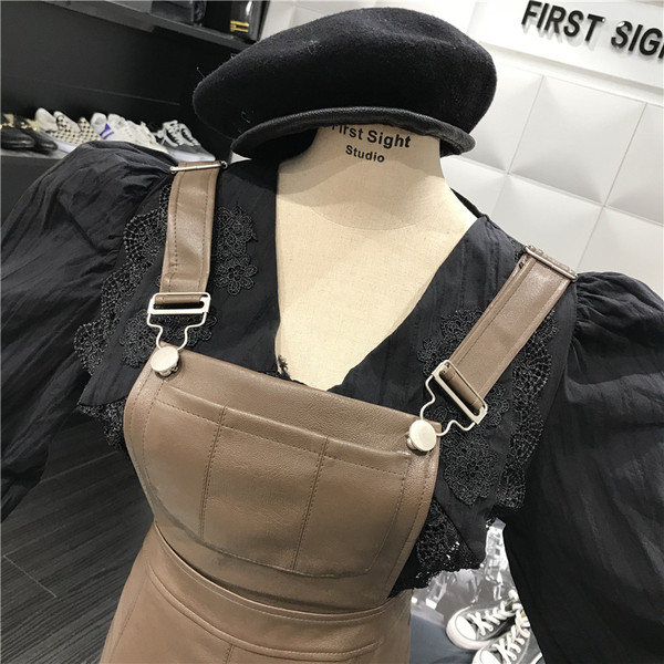 Модерен дамски сукман от еко кожа в черен и кафяв цвят