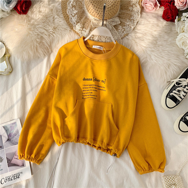 Női alkalmi blúz ovális nyakkivágással és zsebbel több színben