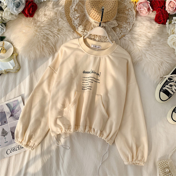 Női alkalmi blúz ovális nyakkivágással és zsebbel több színben