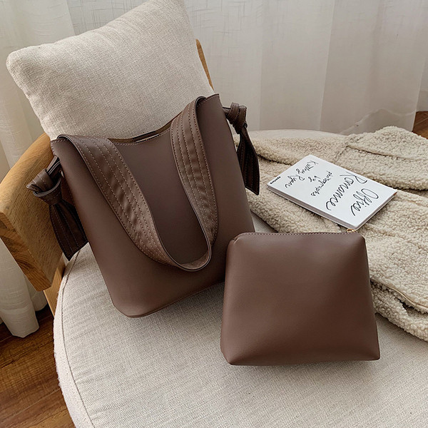 Alkalmi női táska bőr fogantyúval több színben