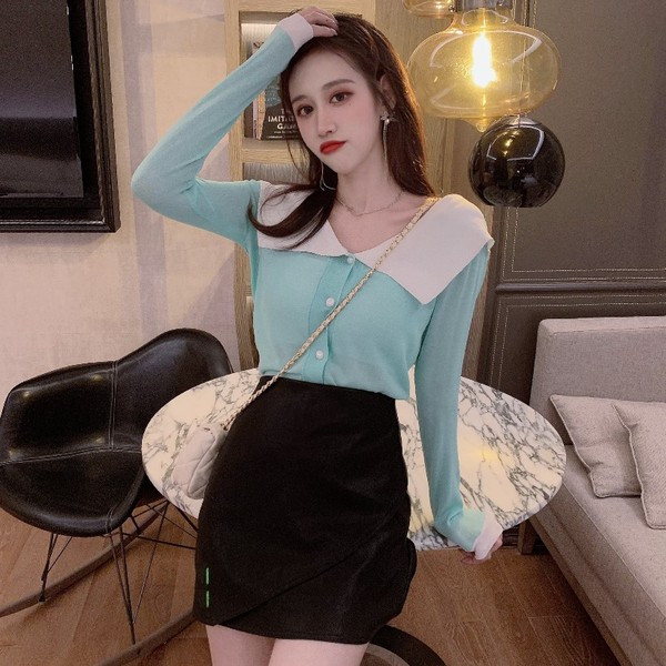 Modern női blúz V-nyakkal és gombokkal