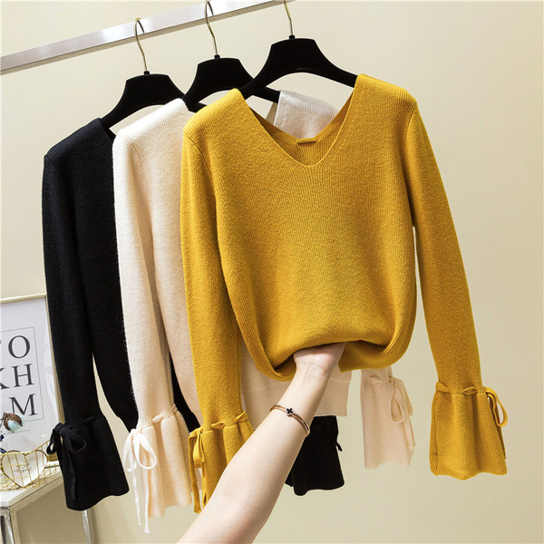 Modern női pulóver lótusz ujjakkal és nyakkendőkkel