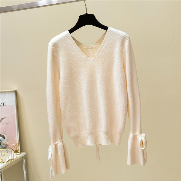 Modern női pulóver lótusz ujjakkal és nyakkendőkkel