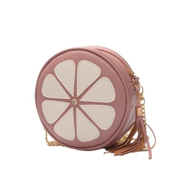 Hétköznapi női táska cipzárral és fém lánccal, kerek formában