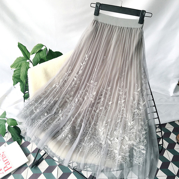 Modern női szoknya virágmintával, több színben tüllel