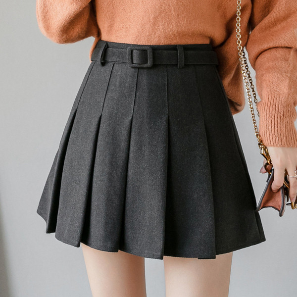 Modern rakott női szoknya övvel fekete, szürke és bézs színben