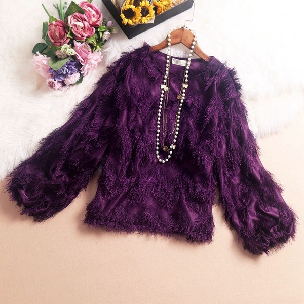 Stílusos női blúz bojttal és hosszú ujjú, különböző színekben