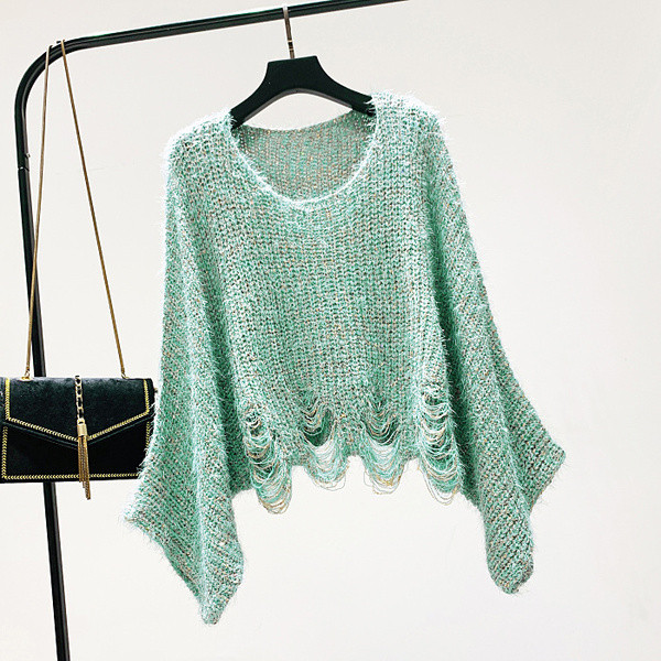 Női téli pulóver kerek nyakkivágással, szakadt motívumokkal zöld színben