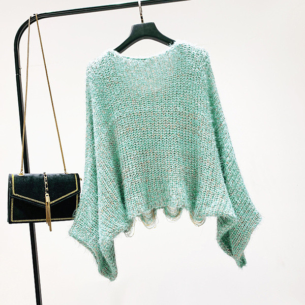 Női téli pulóver kerek nyakkivágással, szakadt motívumokkal zöld színben