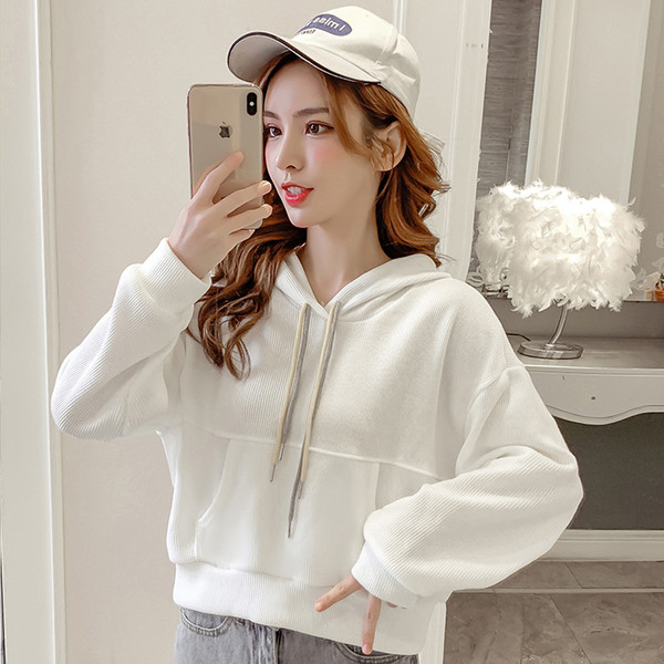 Női pulóver zöld-fehér széles modellben