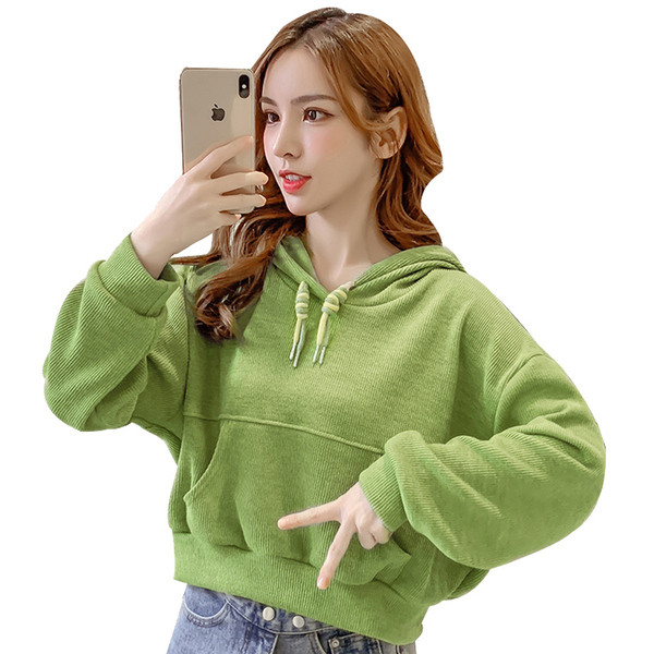 Női pulóver zöld-fehér széles modellben