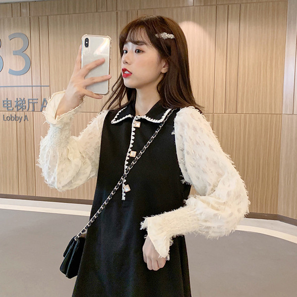 Női aktuális rövid ruha, hosszú ujjú fekete színben