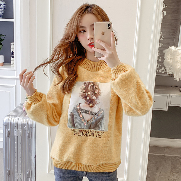 Modern női pulóver négy színben flitterekkel és hímzéssel