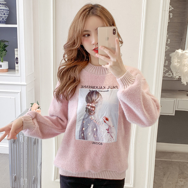 Modern női pulóver négy színben flitterekkel és hímzéssel