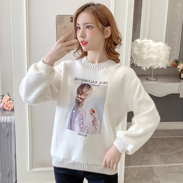 Modern női pulóver négy színben flitterekkel és hímzéssel