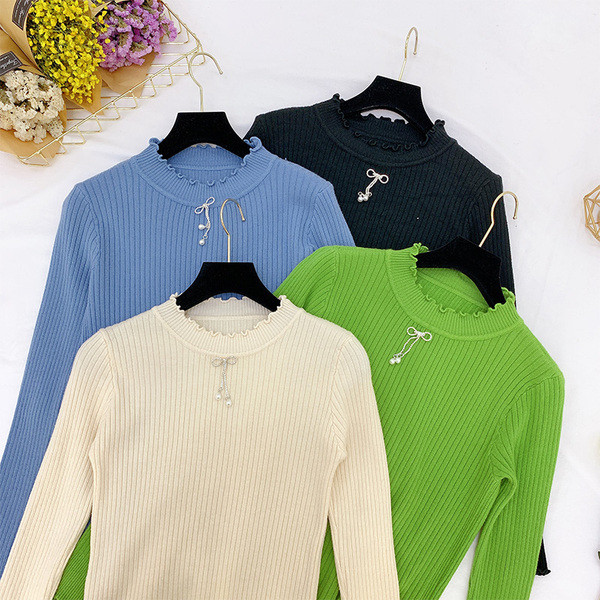 Női pulóver kerek nyakkivágással, több színben