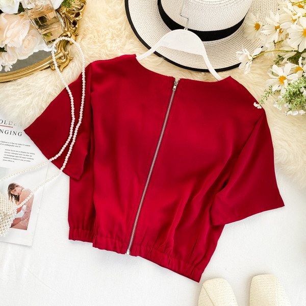 Női alkalmi blúz rövid ujjal és cipzárral több színben