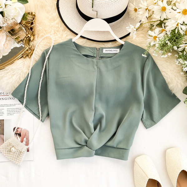 Női alkalmi blúz rövid ujjal és cipzárral több színben