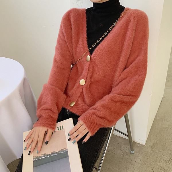 Modern női mellény két színben, gombokkal és spitz nyakkivágással