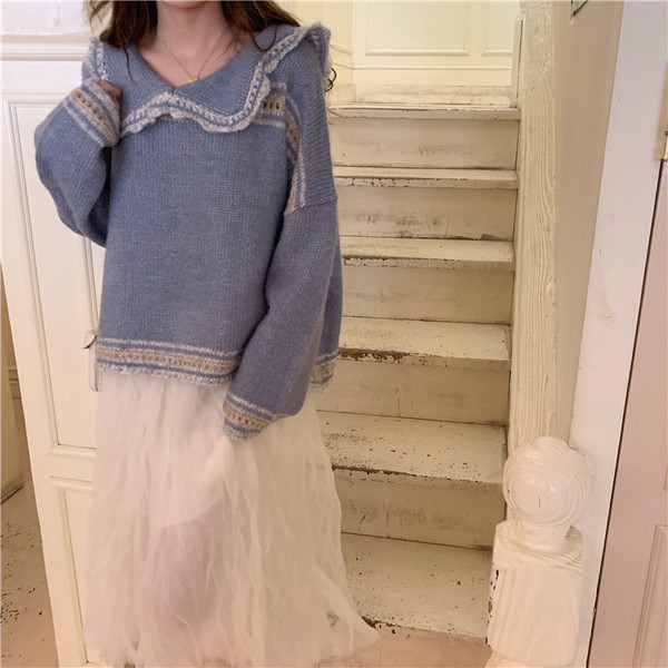 Női alkalmi kötött blúz ovális nyakkivágással, széles modellel