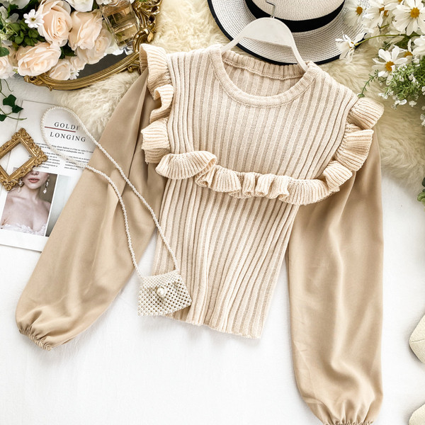 Női pulóver kerek nyakkivágással, több színben