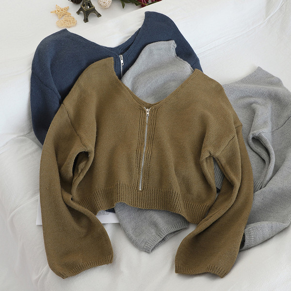 Női blúz több színben cipzárral és V-nyakkal