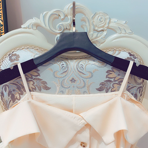 Stílusos női felső, vékony pántokkal, aszimmetrikus modell