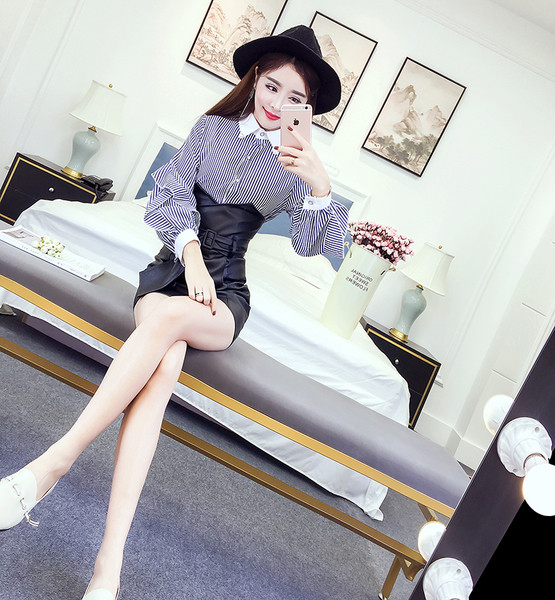 Stílusos női szoknya magas derékkal, fekete és barna övvel