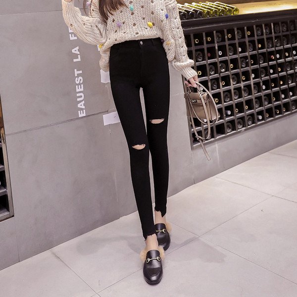 Modern női farmer magas derékkal, szakadt motívumokkal, fekete színben